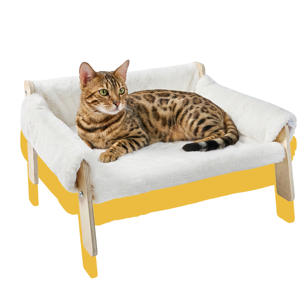 Cat lying on a fluffy white pet bed with wooden legs 
